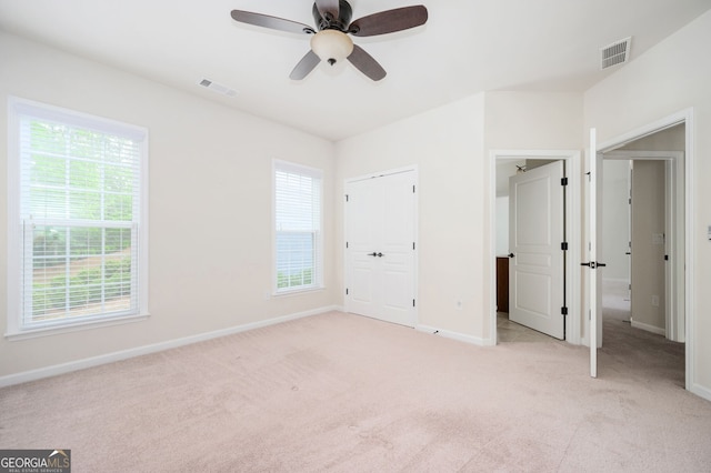 6732 Chimney Ridge Ct, Hoschton, GA 30548 - unfurnished bedroom with light carpet and a ceiling fan