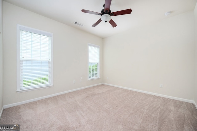 6732 Chimney Ridge Ct, Hoschton, GA 30548 - carpeted empty room with plenty of natural light, a ceiling fan, and a smoke detector