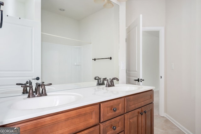 6732 Chimney Ridge Ct, Hoschton, GA 30548 - bathroom featuring double vanity and tile patterned floors