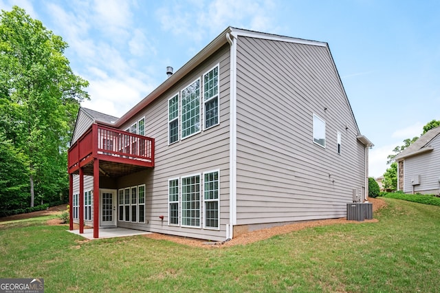 6732 Chimney Ridge Ct, Hoschton, GA 30548 - rear view of house with a lawn, a patio area, and a deck