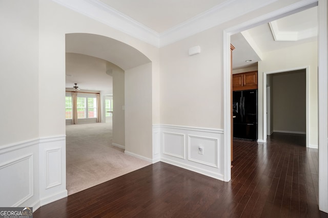 6732 Chimney Ridge Ct, Hoschton, GA 30548 - hallway with arched walkways, wood-type flooring, a wainscoted wall, and crown molding