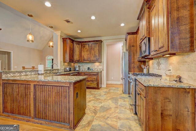 kitchen featuring brown cabinetry, visible vents, and stainless steel appliances