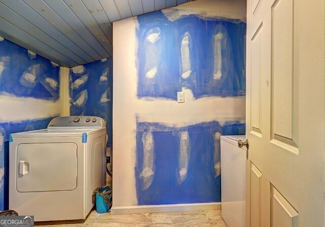 washroom with washer / dryer, wood ceiling, laundry area, and wallpapered walls