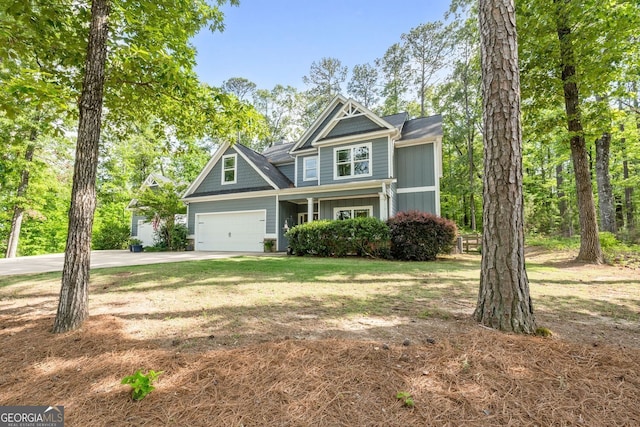 485 Lloyd St, Monticello, GA 31064 - craftsman inspired home featuring concrete driveway, a garage, and board and batten siding