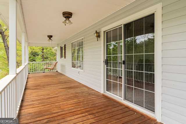 wooden deck featuring covered porch