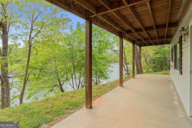 view of patio / terrace featuring a water view
