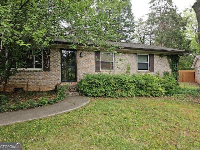 1517 Colony E Cir, Stone Mountain, GA 30083 - view of front of property with a front lawn and brick siding