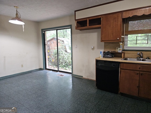 1517 Colony E Cir, Stone Mountain, GA 30083 - kitchen with light countertops, plenty of natural light, a sink, and dishwasher