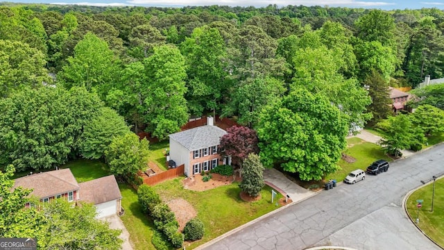 bird's eye view featuring a forest view