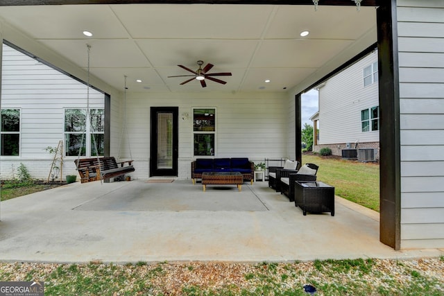 view of patio with central AC, an outdoor living space, and a ceiling fan
