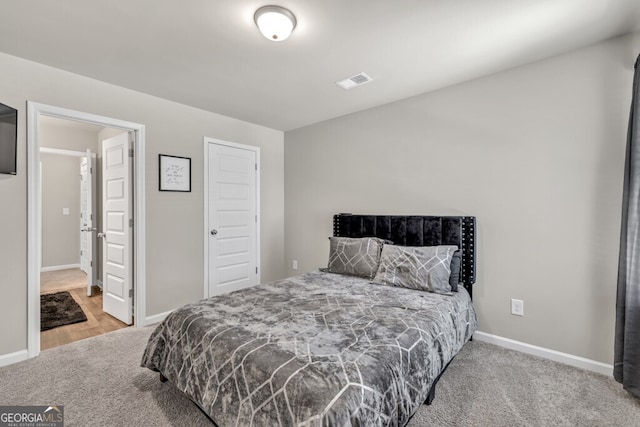 233 Jim Daws Rd, Monroe, GA 30655 - bedroom with carpet and baseboards