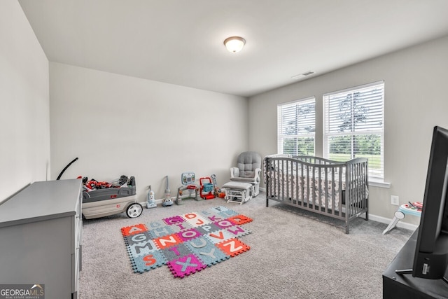 carpeted bedroom with visible vents