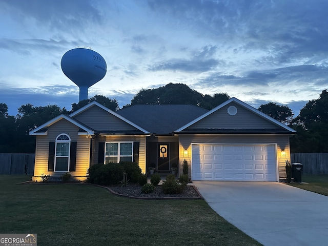 view of front of property featuring a garage and driveway