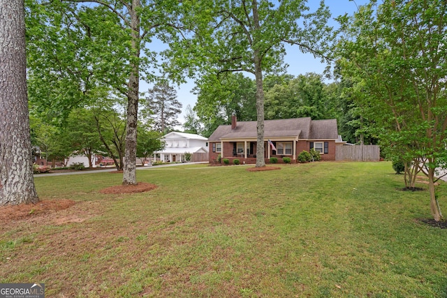 1154 Rome St, Carrollton, GA 30117 - ranch-style home with a chimney, covered porch, and brick siding