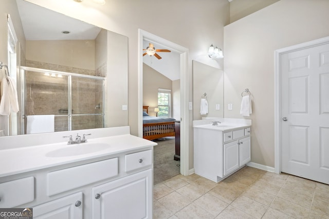 1355 Hesse Ln, Austell, GA 30106 - ensuite bathroom with ceiling fan, two vanities, a sink, and a stall shower