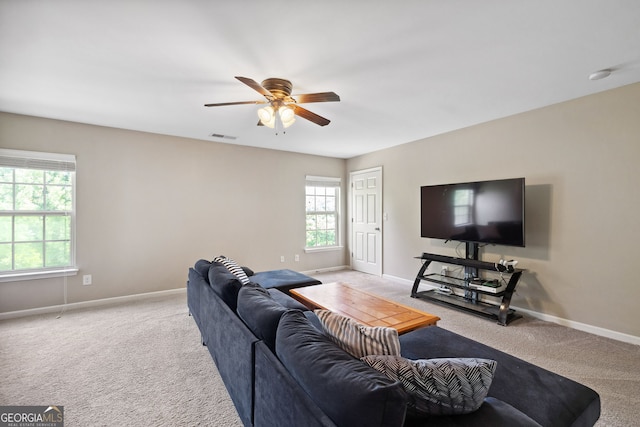 1355 Hesse Ln, Austell, GA 30106 - living room with baseboards, ceiling fan, carpet flooring, and visible vents