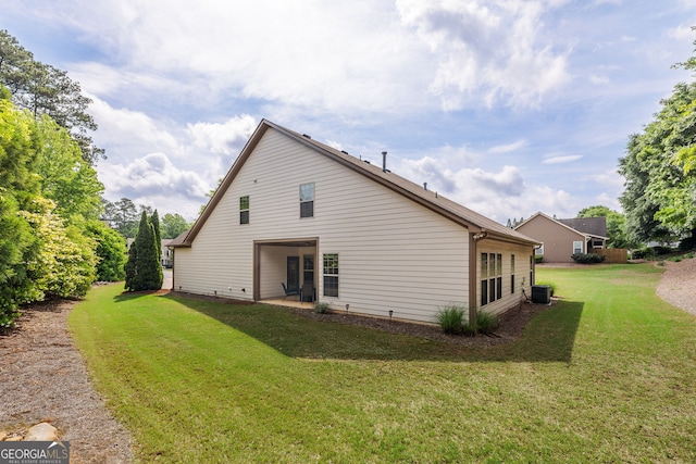 1355 Hesse Ln, Austell, GA 30106 - back of house featuring a patio area and a yard