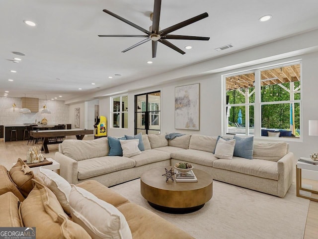 650 Jones Rd, Roswell, GA 30075 - living area featuring visible vents, recessed lighting, a ceiling fan, and wood finished floors