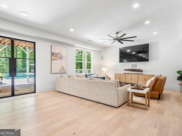 650 Jones Rd, Roswell, GA 30075 - living room with ceiling fan, french doors, baseboards, light wood-style floors, and recessed lighting