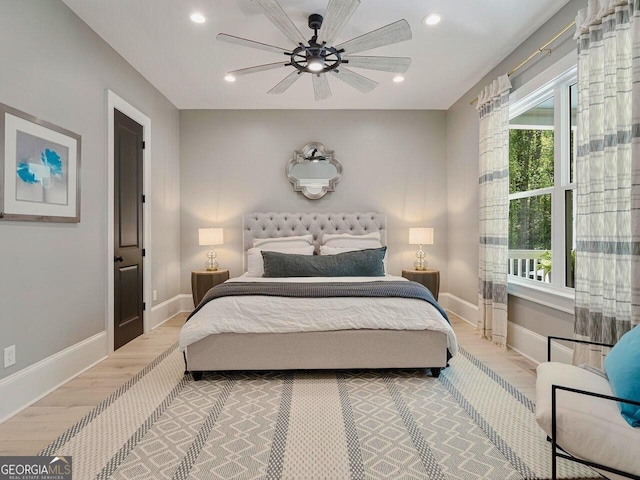 650 Jones Rd, Roswell, GA 30075 - bedroom with recessed lighting, baseboards, ceiling fan, and wood finished floors