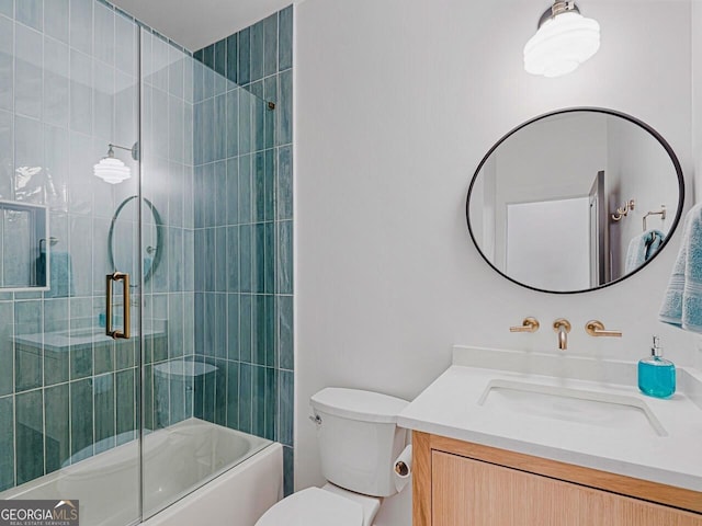 650 Jones Rd, Roswell, GA 30075 - bathroom with toilet, shower / bath combination with glass door, and vanity