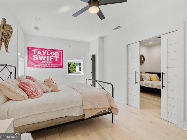 650 Jones Rd, Roswell, GA 30075 - bedroom featuring visible vents, a ceiling fan, light wood finished floors, and recessed lighting