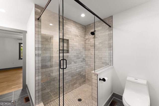 364 Cherokee Trce, Dahlonega, GA 30533 - bathroom with baseboards, a shower stall, recessed lighting, and toilet