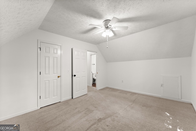 364 Cherokee Trce, Dahlonega, GA 30533 - bonus room featuring ceiling fan, vaulted ceiling, and light colored carpet