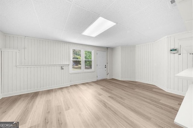 spare room featuring wood finished floors