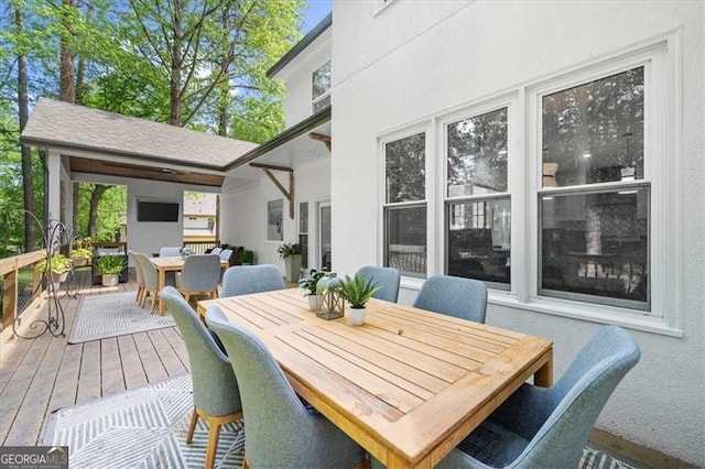 deck featuring outdoor dining space