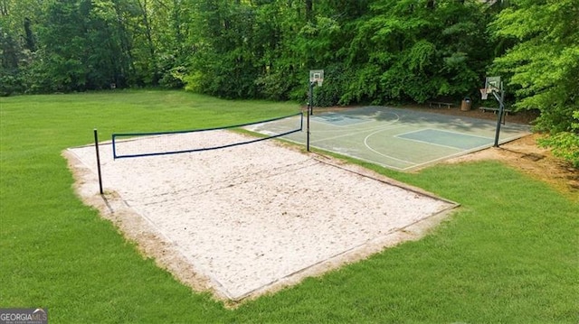 view of sport court with a lawn, community basketball court, and volleyball court