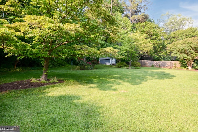 view of yard featuring fence