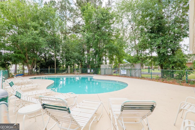 1921 Gornto Rd Unit 10, Valdosta, GA 31602 - pool with a patio area and fence