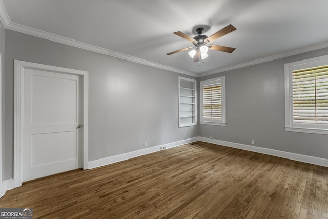 603 Piney Woods Dr, Lagrange, GA 30240 - unfurnished room featuring crown molding, built in features, wood finished floors, baseboards, and plenty of natural light