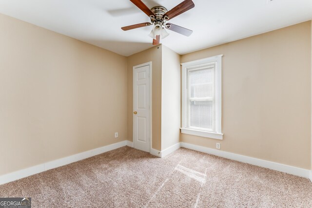 2497 Lakewood Ave SW, Atlanta, GA 30315 - carpeted spare room featuring baseboards and ceiling fan
