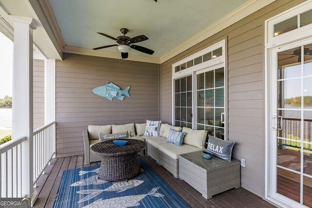 exterior space with ceiling fan and an outdoor living space