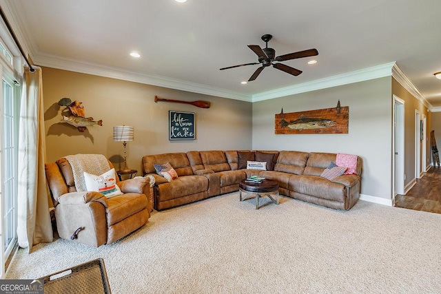 living area with crown molding, carpet flooring, a ceiling fan, baseboards, and recessed lighting