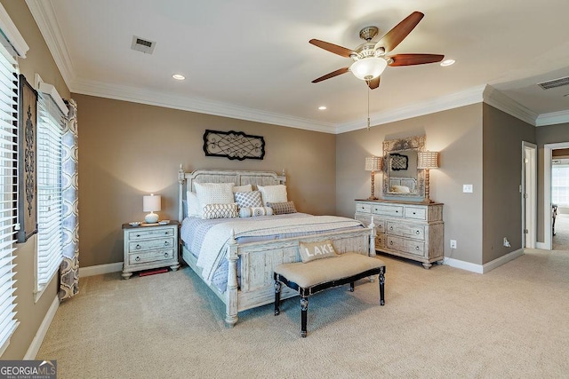 bedroom with light colored carpet, visible vents, multiple windows, and ornamental molding