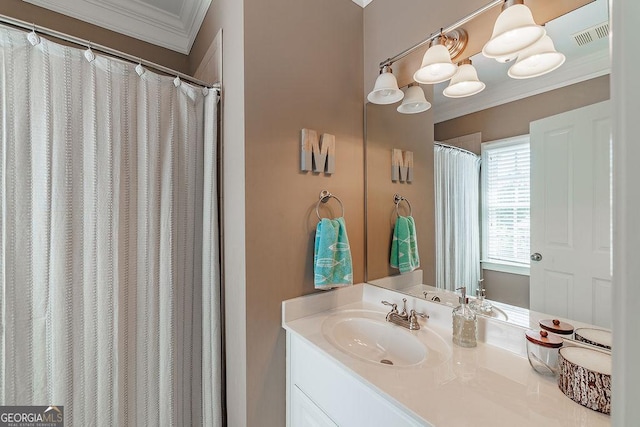 full bathroom with crown molding, visible vents, and vanity