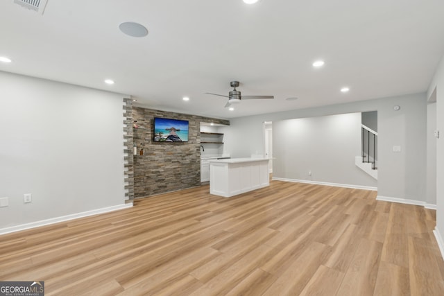 110 Keswick Way, Alpharetta, GA 30022 - unfurnished living room with a ceiling fan, recessed lighting, light wood-style flooring, and stairway