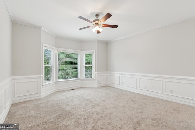 110 Keswick Way, Alpharetta, GA 30022 - spare room featuring crown molding, a wainscoted wall, a ceiling fan, and carpet floors