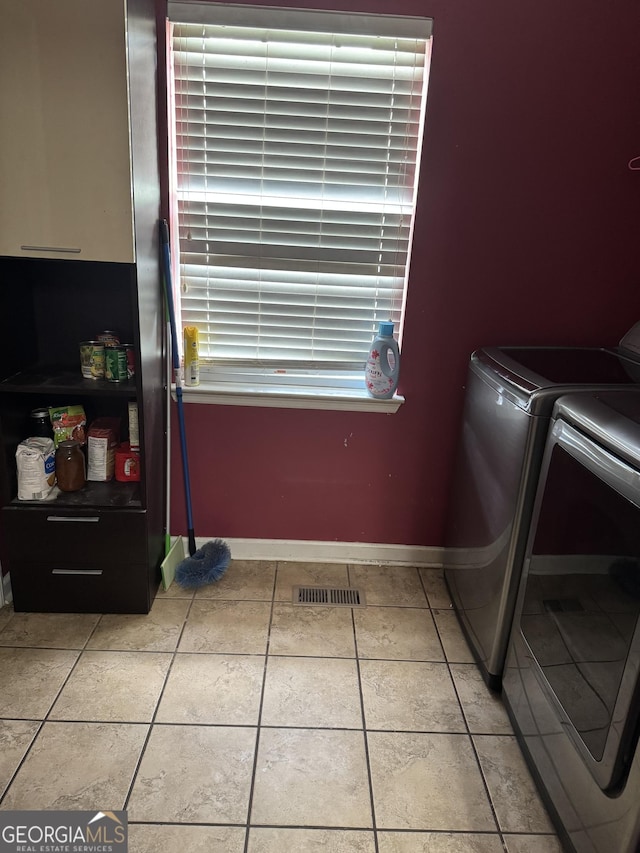 182 Boxer Ln, Rock Spring, GA 30739 - laundry area featuring washing machine and dryer and light tile patterned flooring