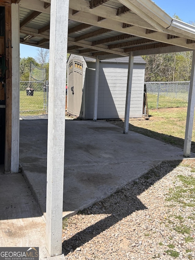 182 Boxer Ln, Rock Spring, GA 30739 - view of patio with a storage unit
