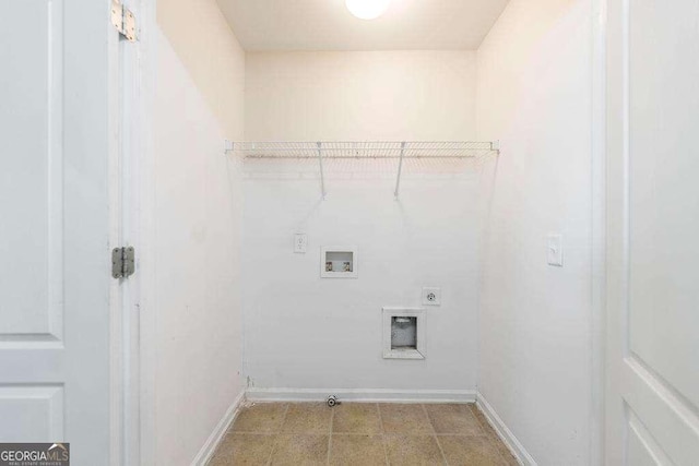 laundry area with baseboards, hookup for an electric dryer, laundry area, and hookup for a washing machine