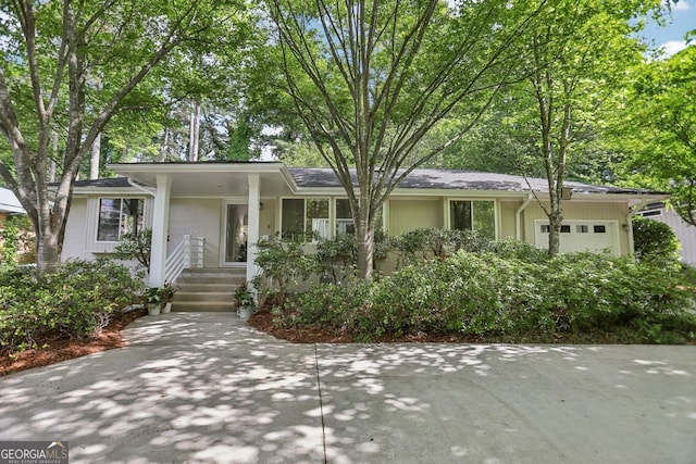 1410 Lively Ridge Rd, Atlanta, GA 30329 - view of front of home with a garage and brick siding