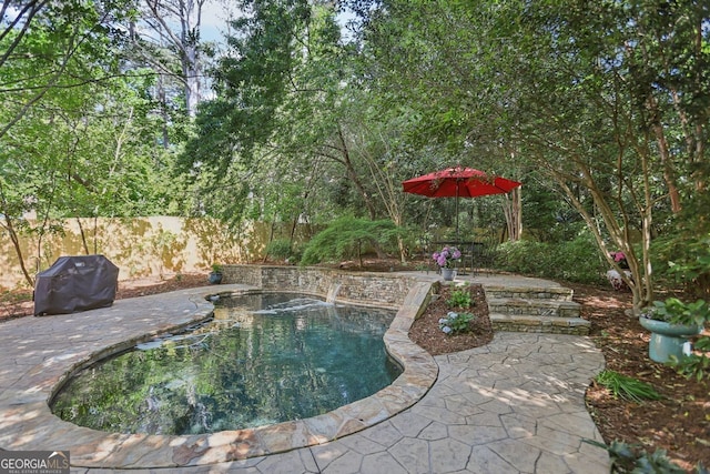 1410 Lively Ridge Rd, Atlanta, GA 30329 - view of swimming pool with a patio, fence, and a grill