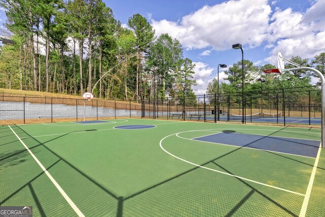 264 Oliver Dr, Locust Grove, GA 30248 - view of sport court featuring fence and community basketball court