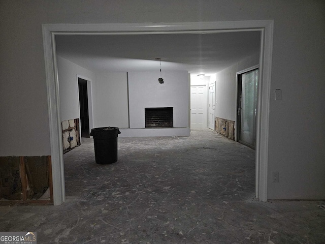 5655 Lake Forrest Dr NW, Atlanta, GA 30342 - unfurnished living room featuring a fireplace
