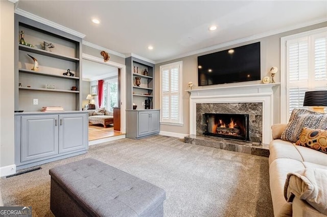 3389 Robinson Farms Trce NE, Marietta, GA 30068 - living room with ornamental molding, light carpet, a fireplace, baseboards, and recessed lighting
