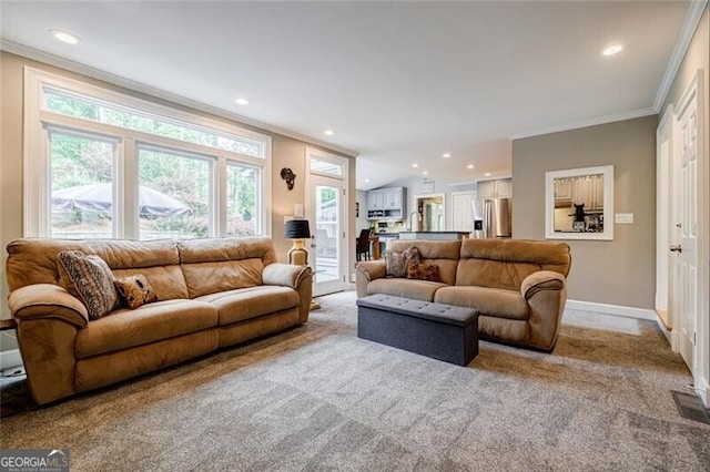 3389 Robinson Farms Trce NE, Marietta, GA 30068 - carpeted living room featuring crown molding, recessed lighting, and baseboards